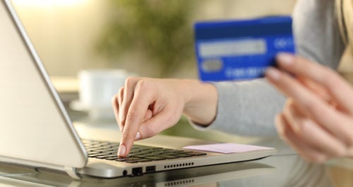 Close,Up,Of,Woman,Hands,Paying,Online,Entering,Credit,Card