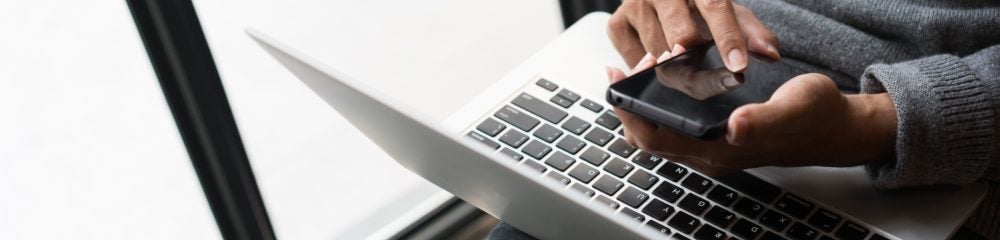 Woman applying for a fast business loan on her phone