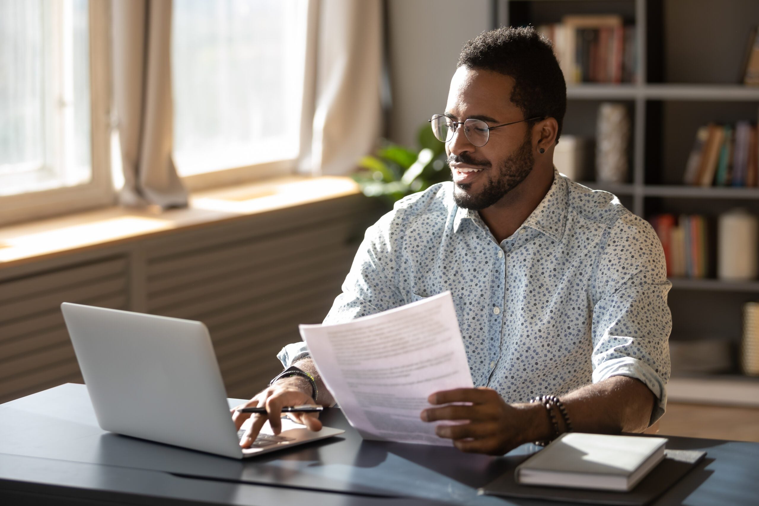 business-owner-at-desk-with-computer